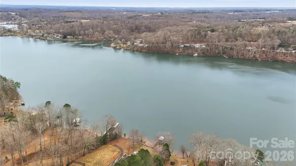 a view of a lake with a yard