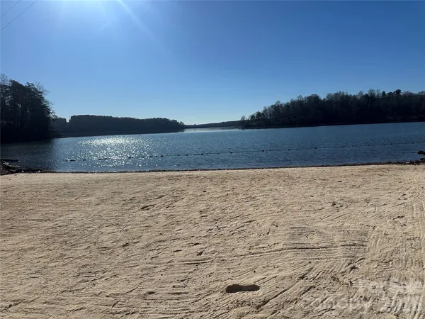 a view of outdoor space with deck and yard
