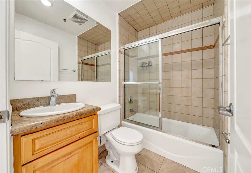 316 South New Hampshire Avenue, Unit 307 Los Angeles, CA 90020 - Photo 13 of 23 a bathroom with a sink toilet and shower