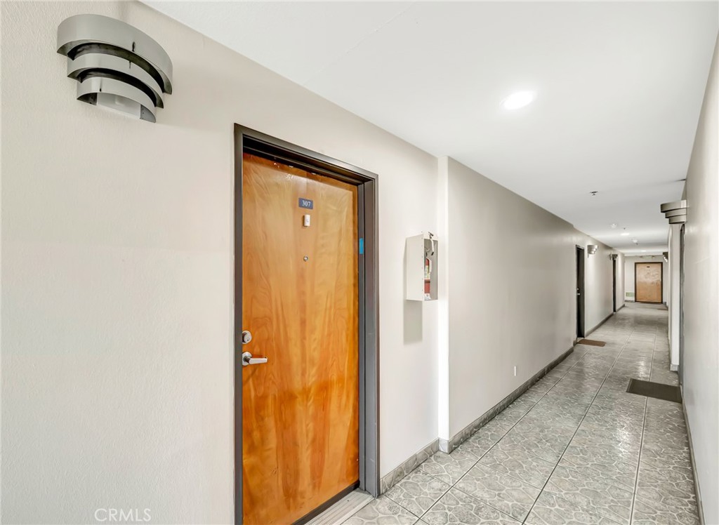 316 South New Hampshire Avenue, Unit 307 Los Angeles, CA 90020 - Photo 20 of 23 a view of a closet area with windows