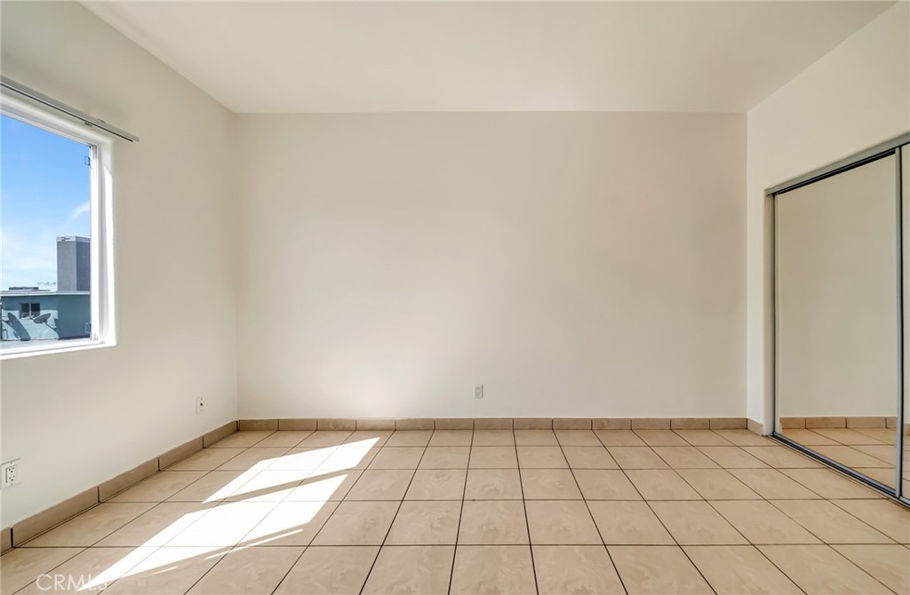 316 South New Hampshire Avenue, Unit 307 Los Angeles, CA 90020 - Photo 8 of 23 a view of an empty room