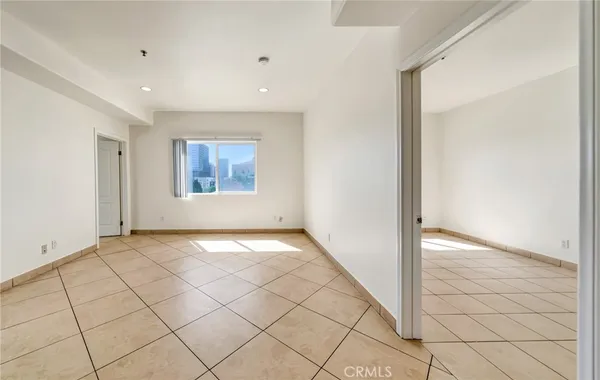 a view of an empty room and window