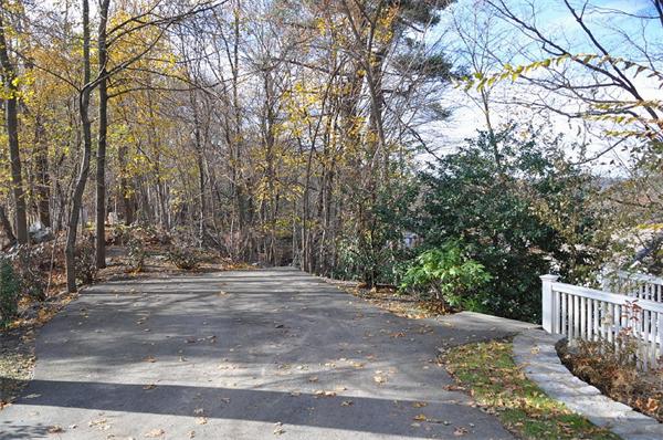 133 Walnut Street Wellesley, MA 02481 - Photo 11 of 12 a view of backyard with green space