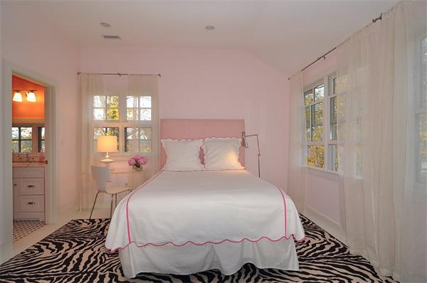 133 Walnut Street Wellesley, MA 02481 - Photo 5 of 12 a bedroom with a bed and wooden floor