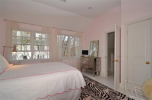 133 Walnut Street Wellesley, MA 02481 - Photo 6 of 12 a bedroom with a bed and a large window