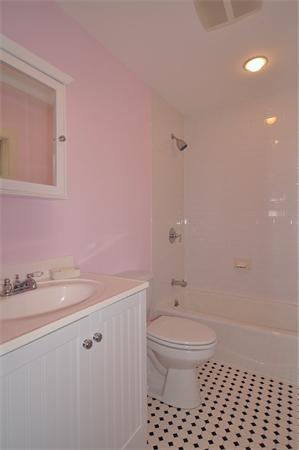 133 Walnut Street Wellesley, MA 02481 - Photo 9 of 12 a bathroom with a sink a toilet and shower