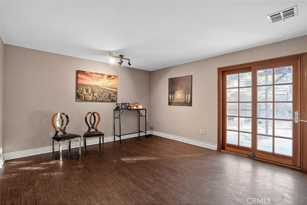 31653 Lake Meadow Road Acton, CA 93510 - Photo 14 of 32 a view of a livingroom with furniture and windows