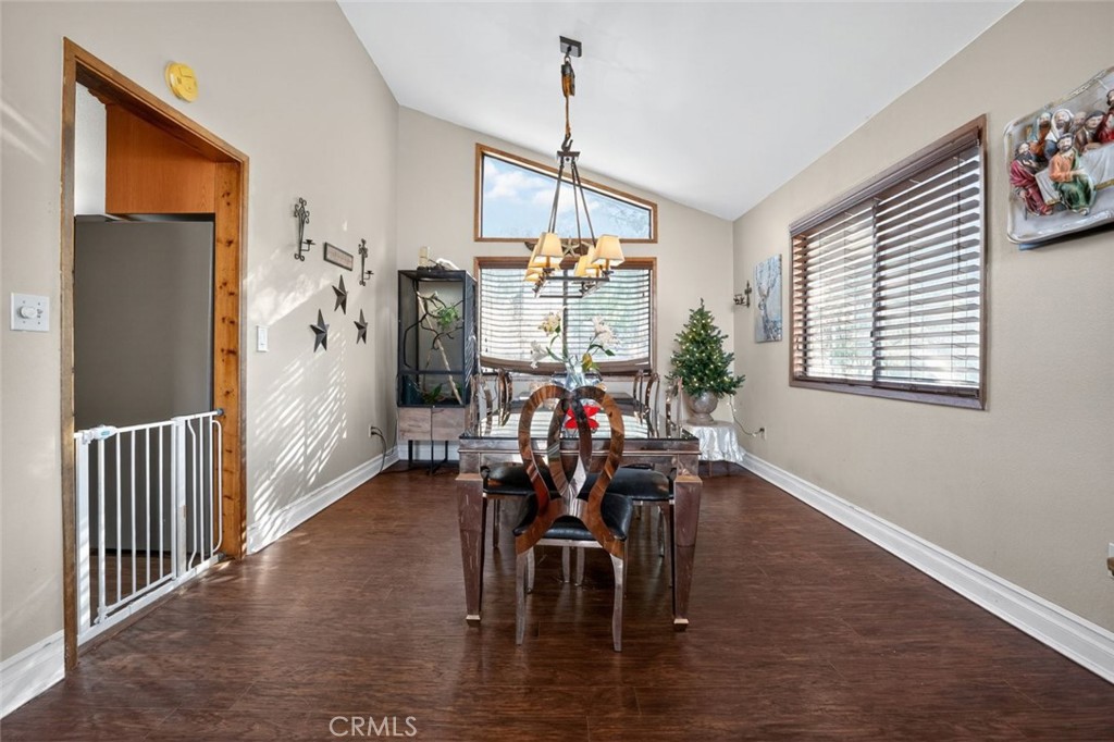31653 Lake Meadow Road Acton, CA 93510 - Photo 22 of 32 a view of a dining room with furniture window and wooden floor