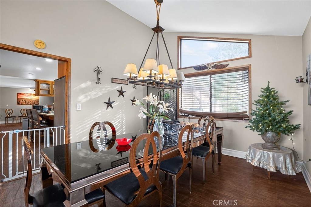 31653 Lake Meadow Road Acton, CA 93510 - Photo 23 of 32 a view of a dining room with furniture window and wooden floor