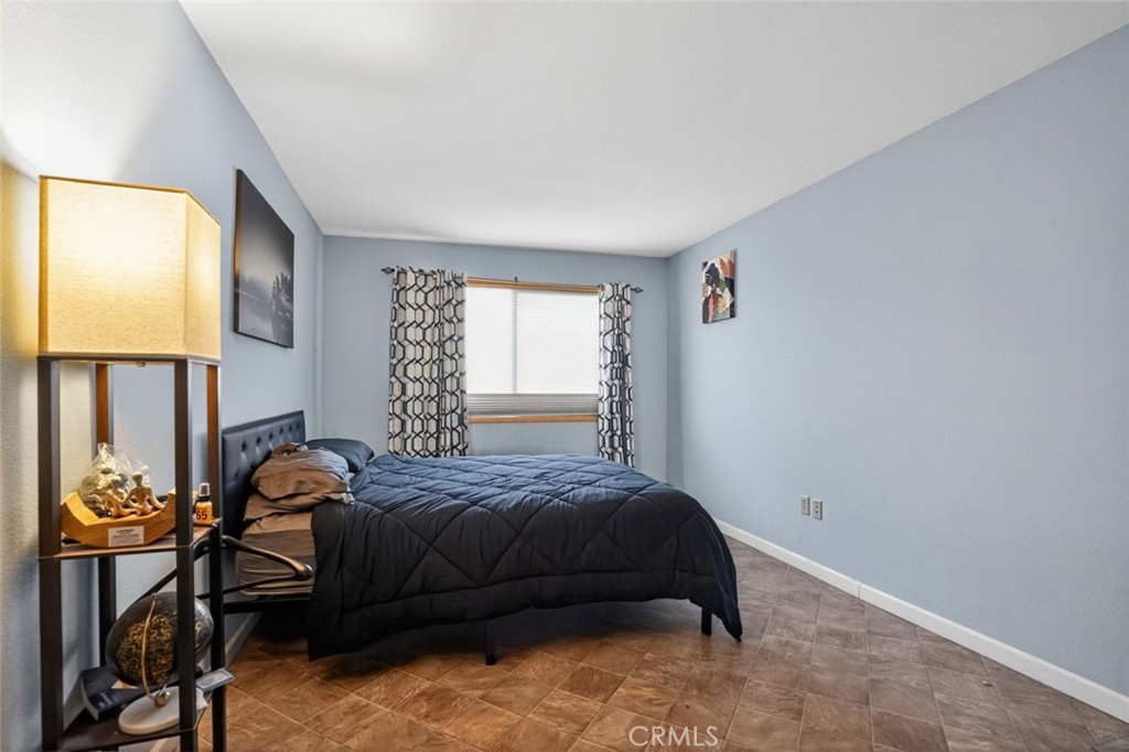 31653 Lake Meadow Road Acton, CA 93510 - Photo 28 of 32 a bedroom with a bed and a window