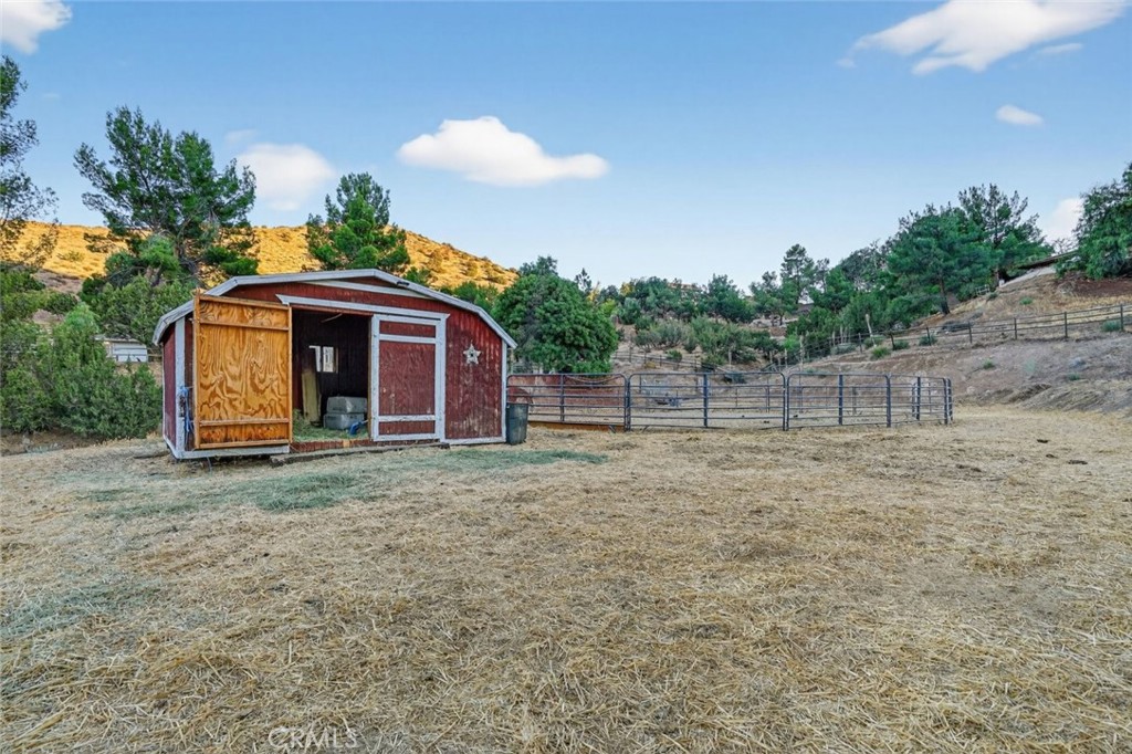 31653 Lake Meadow Road Acton, CA 93510 - Photo 9 of 32 a view of a house with a backyard