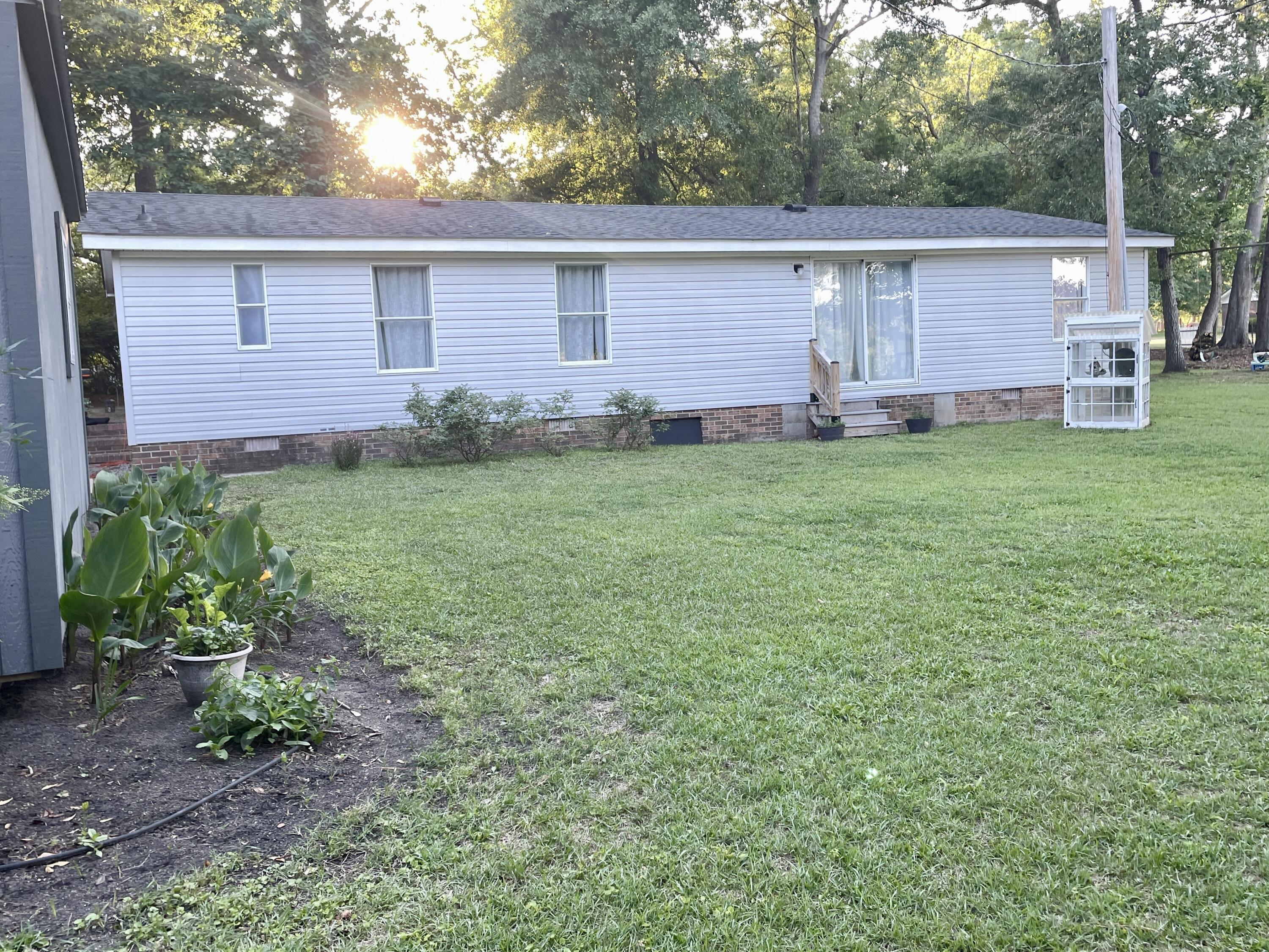 2166 Healing Springs Road Blackville, SC 29817 - Photo 38 of 43 a front view of a house with garden