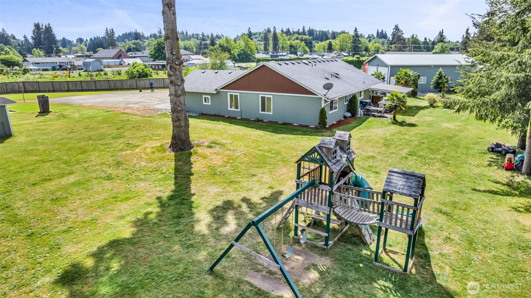 10313 School Land Road Southwest Rochester, WA 98579 - Photo 10 of 40 a view of a lake with a table and chairs
