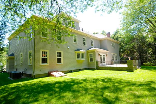14 Hathaway Road Lexington, MA 02420 - Photo 3 of 8 a front view of a house with a yard