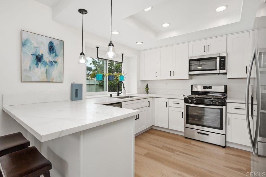 1998 Paseo Del Rey Vista, CA 92084 - Photo 1 of 1 Kitchen with quartz countertops