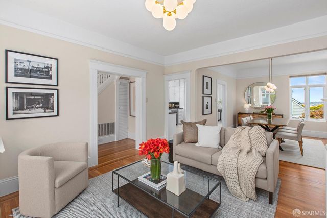a kitchen with cabinets appliances and a sink
