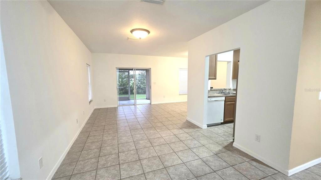 14875 Skip Jack Loop Lakewood Ranch, FL 34202 - Photo 5 of 18 a view of a kitchen with a sink and a window
