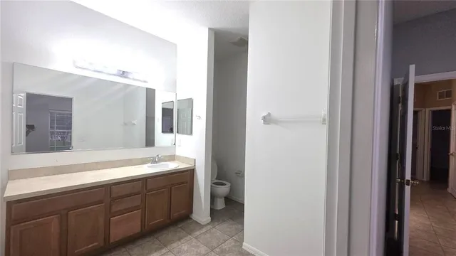 a view of a room that has a large window