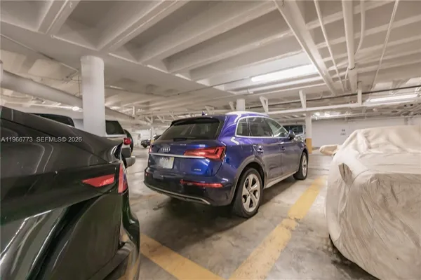 a view of a garage with car parked