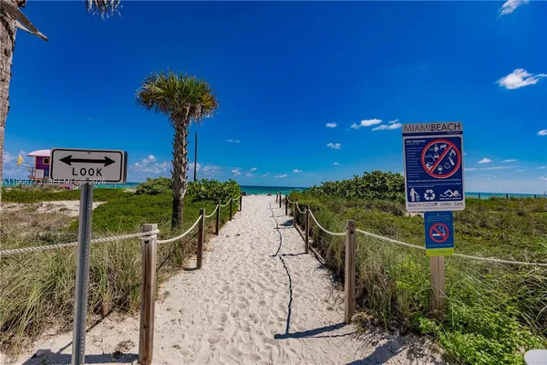 a sign that is on the side of the building