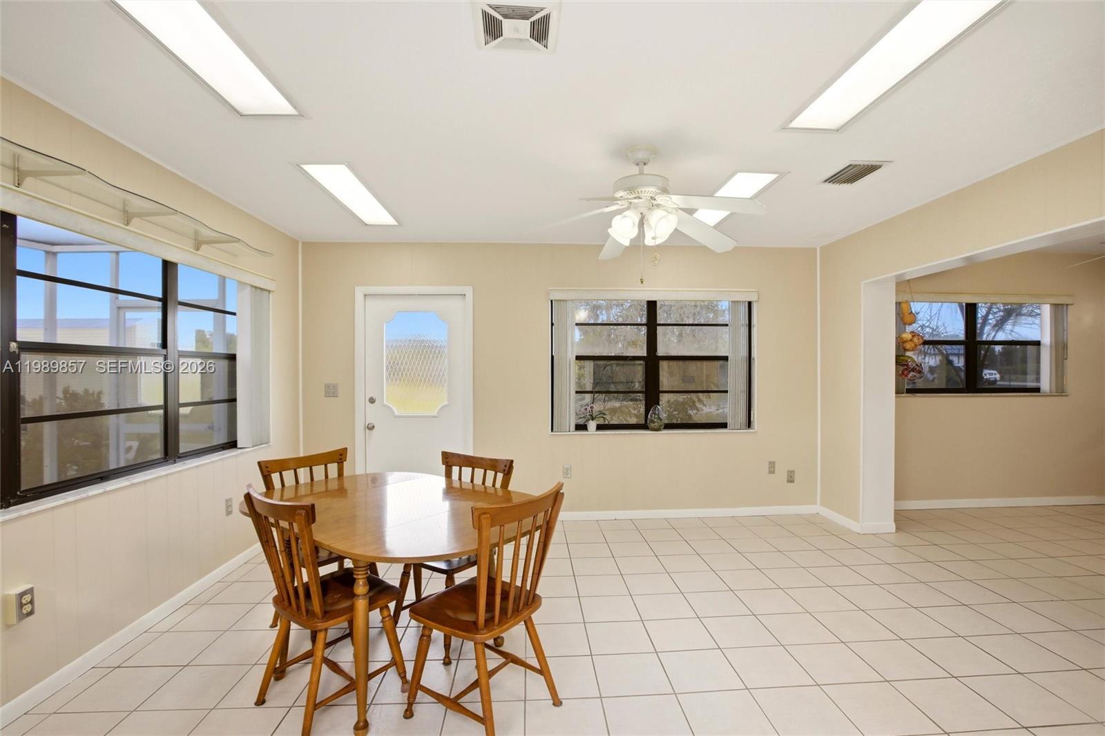 49 Williams Road Lake Placid, FL 33852 - Photo 14 of 61 a view of a dining room with furniture and chandelier