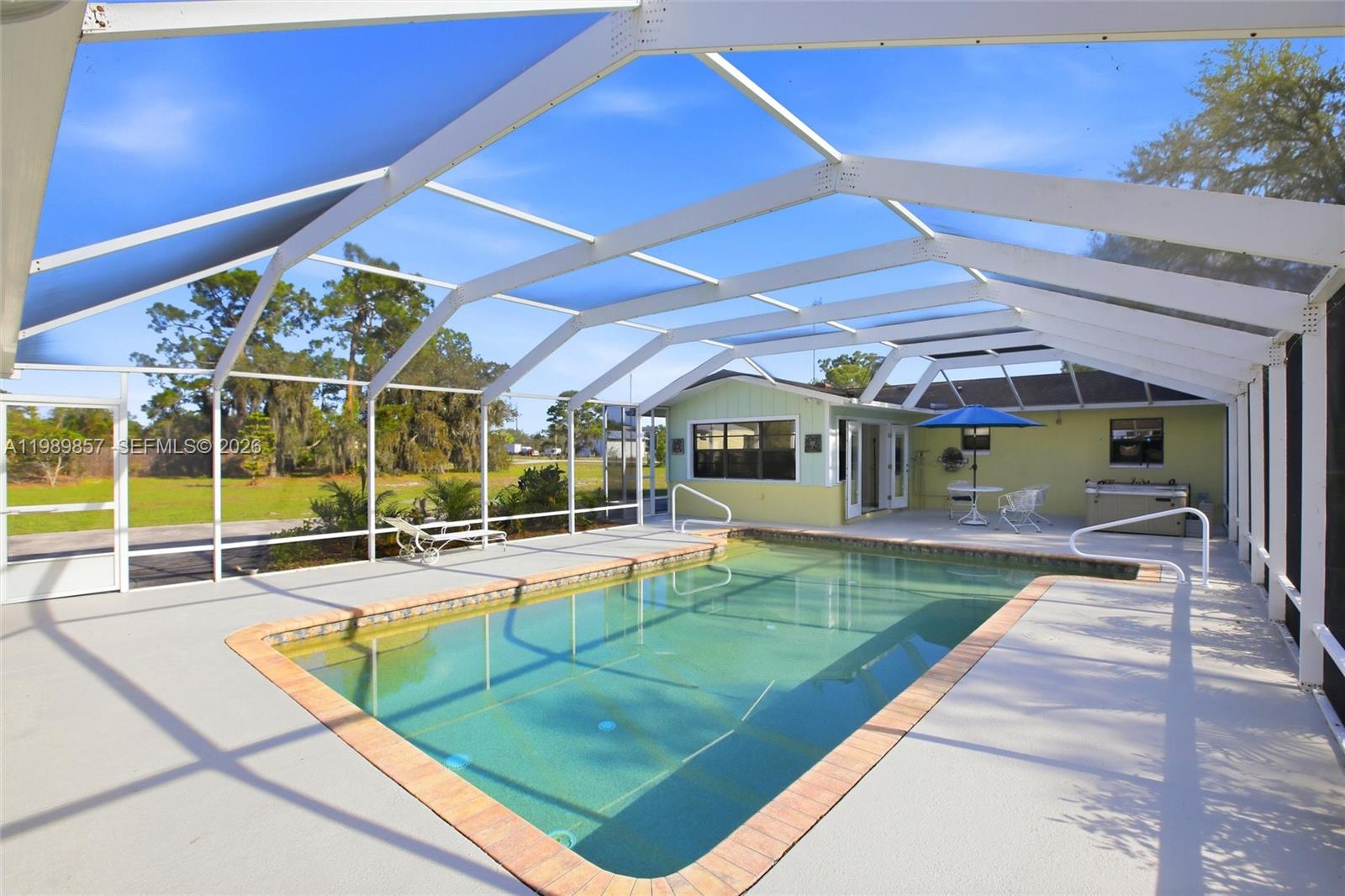 49 Williams Road Lake Placid, FL 33852 - Photo 41 of 61 swimming pool with outdoor seating