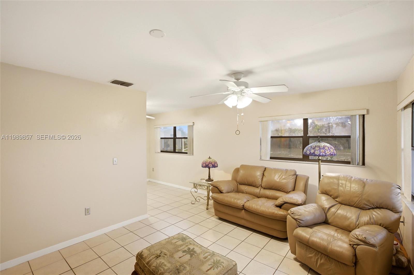49 Williams Road Lake Placid, FL 33852 - Photo 5 of 61 a living room with furniture and white walls