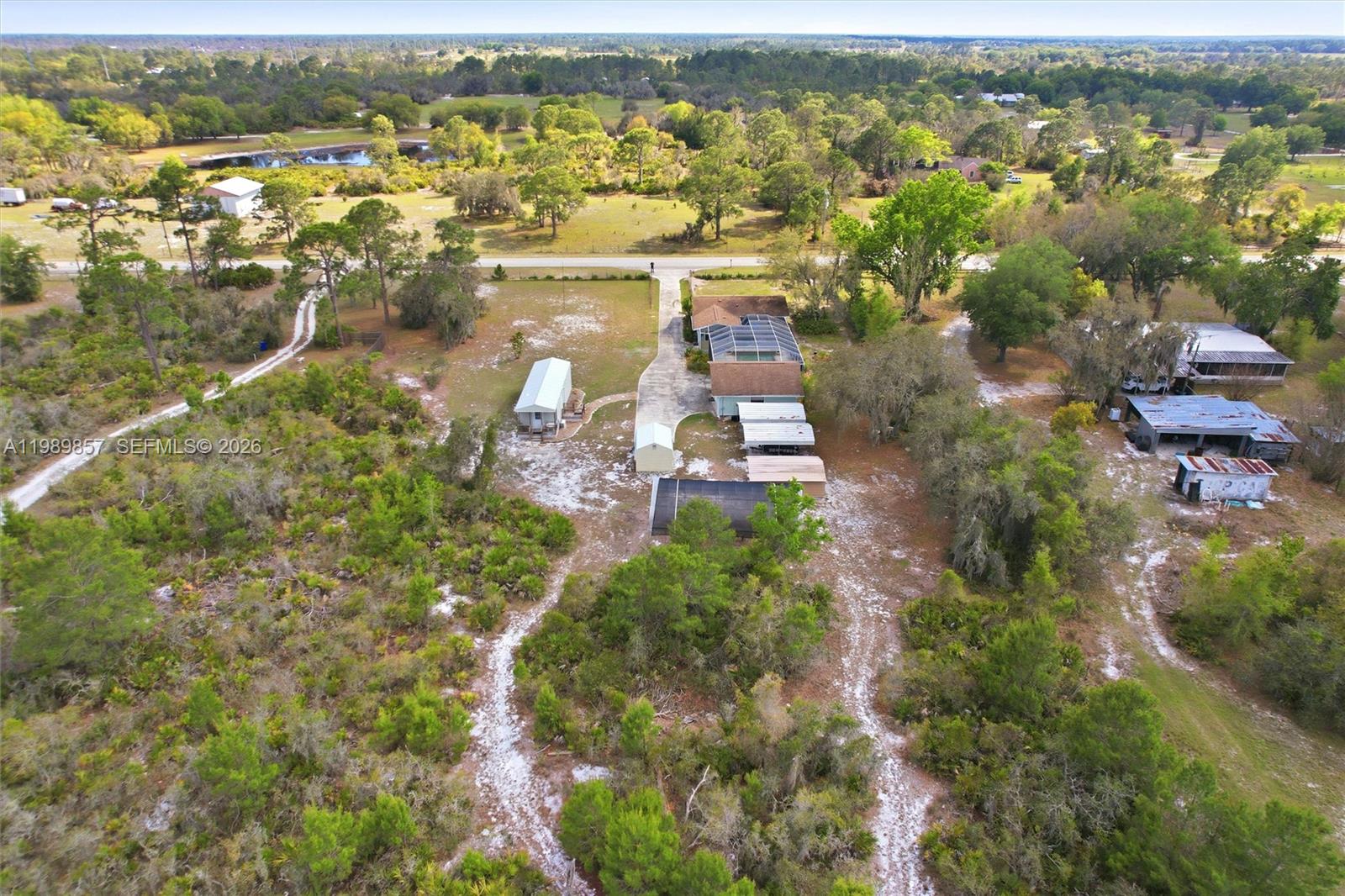 49 Williams Road Lake Placid, FL 33852 - Photo 59 of 61 an aerial view of residential houses with outdoor space