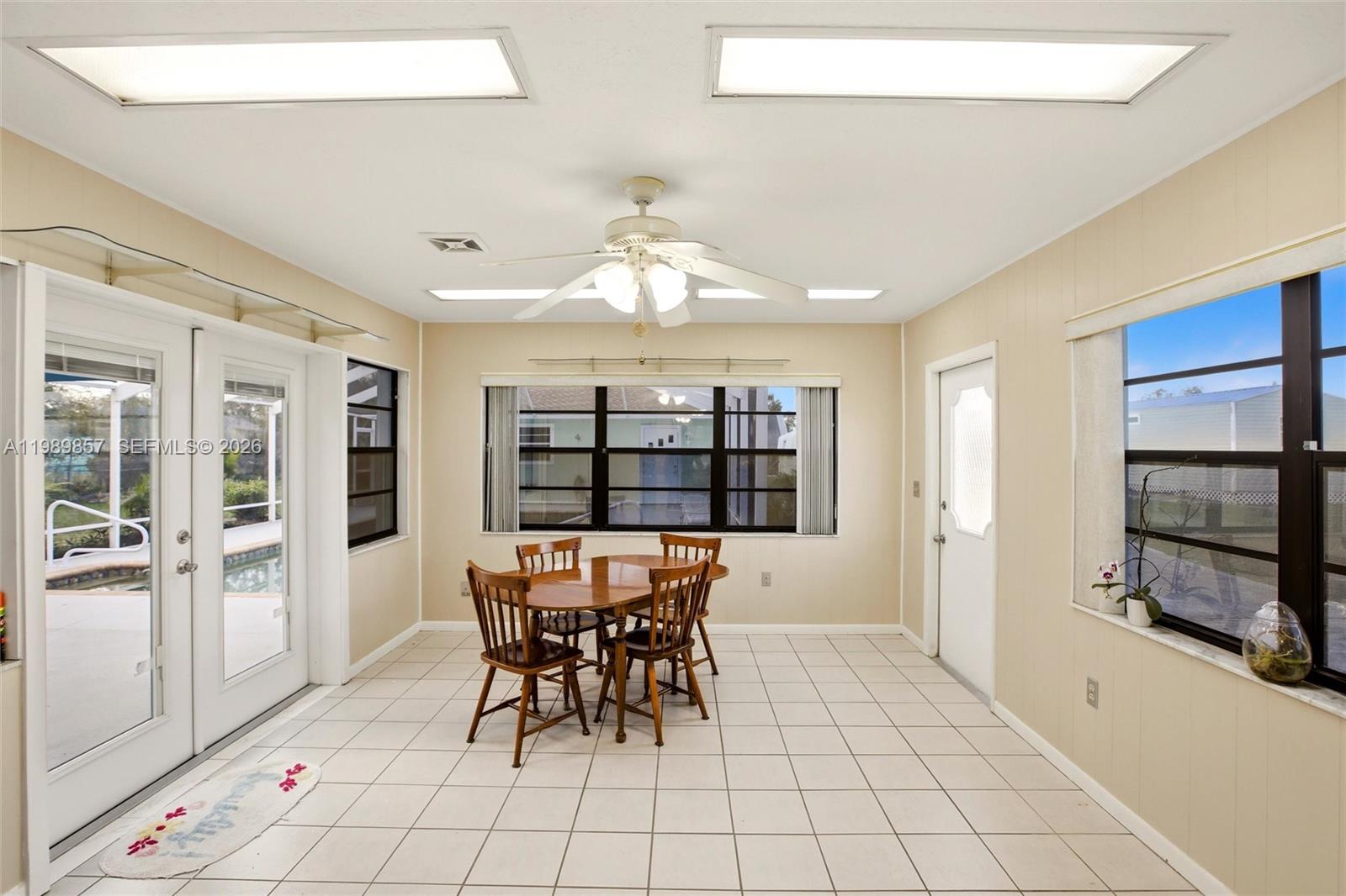 49 Williams Road Lake Placid, FL 33852 - Photo 10 of 61 a view of a dining room with furniture and a chandelier