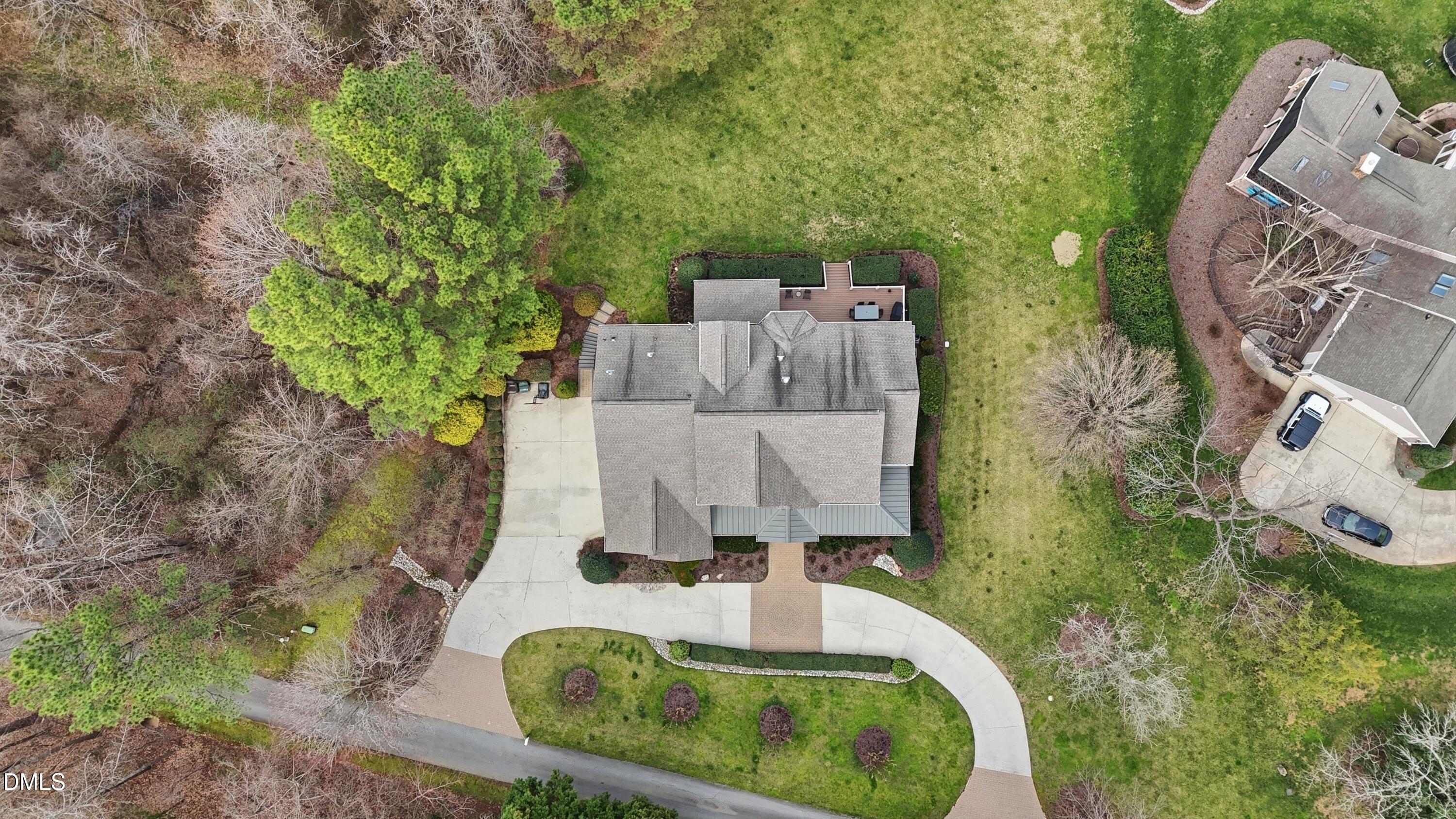 300 Lake Manor Road Chapel Hill, NC 27516 - Photo 78 of 99 an aerial view of a house with a yard