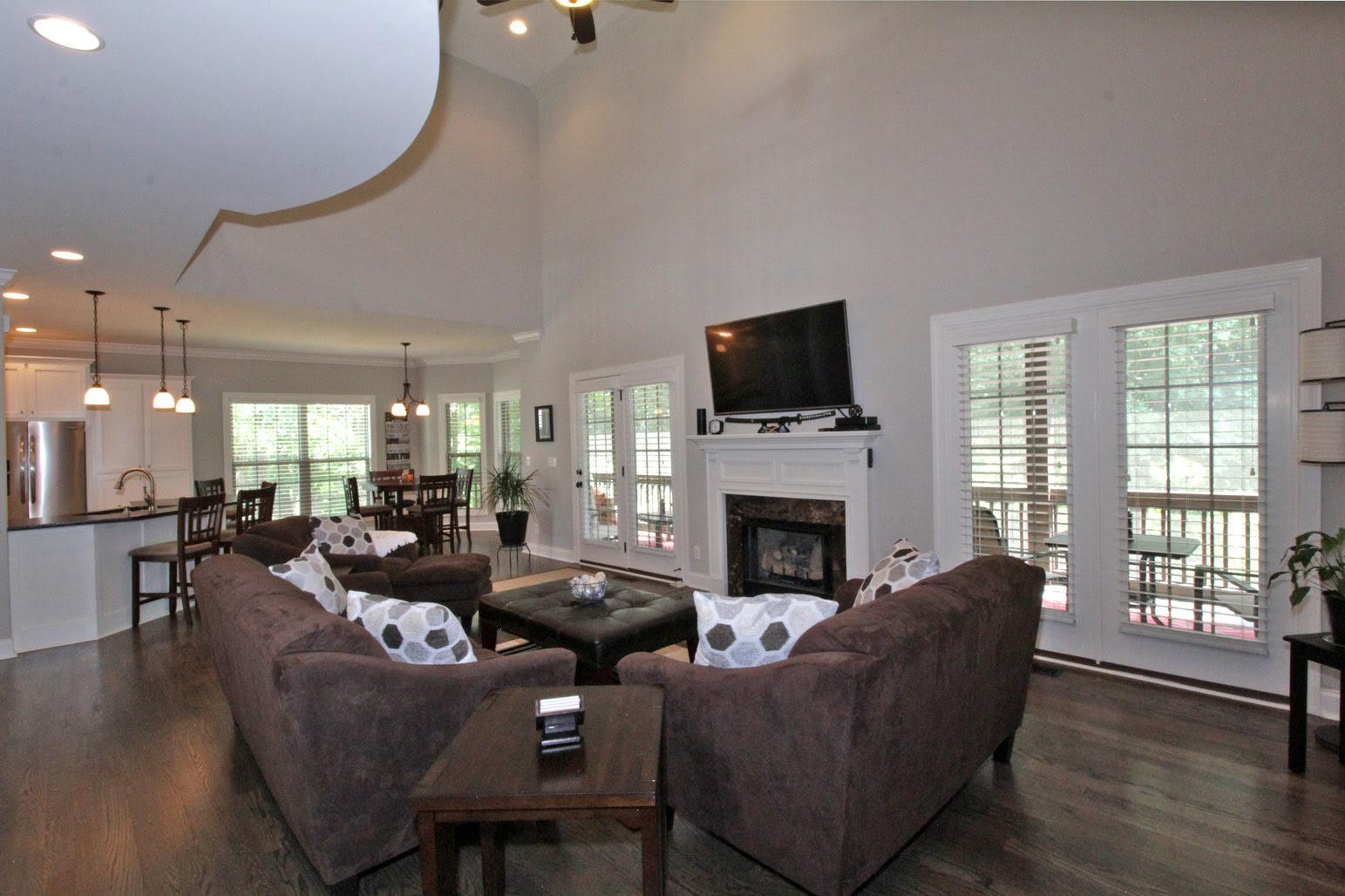 321 Cayce Drive Springfield, TN 37172 - Photo 30 of 30 a living room with furniture a fireplace and a flat screen tv