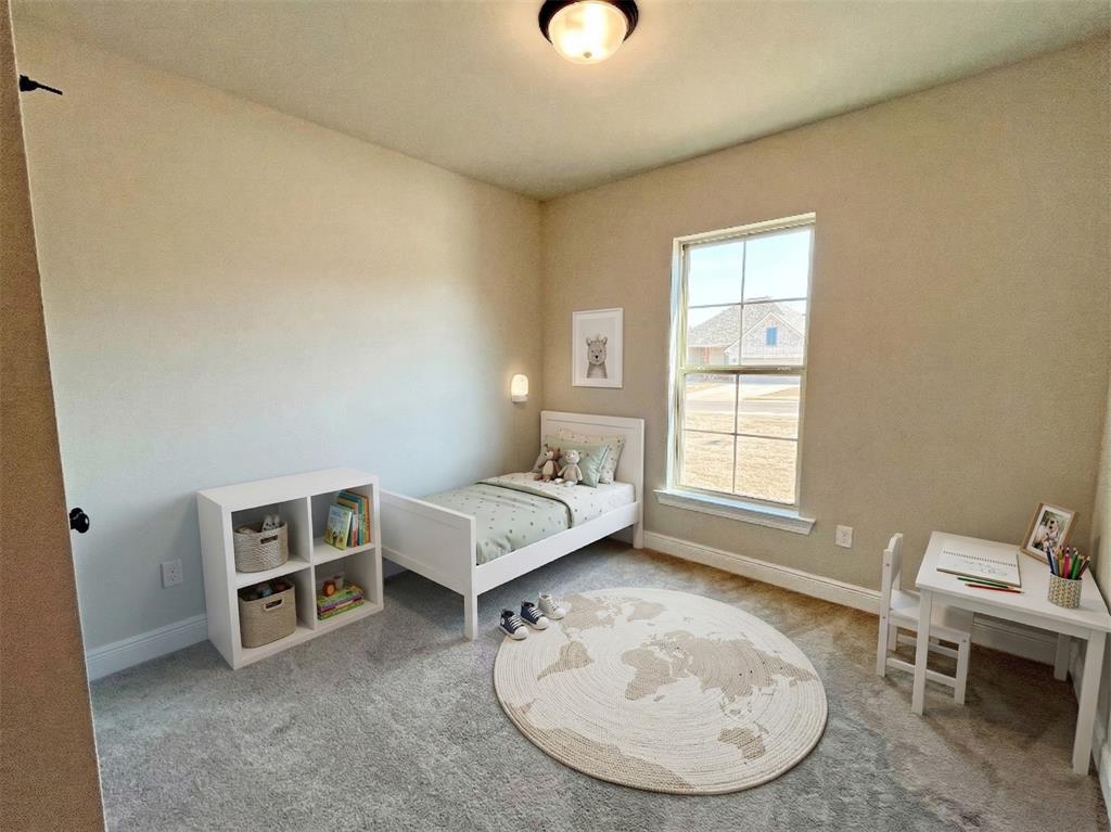 369 Hummingbird Lane Princeton, LA 71067 - Photo 12 of 22 a view of a livingroom with furniture and a window