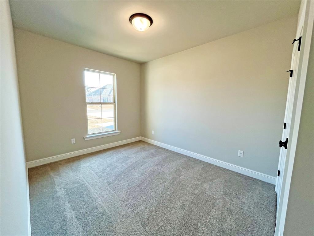 369 Hummingbird Lane Princeton, LA 71067 - Photo 13 of 22 an empty room with windows