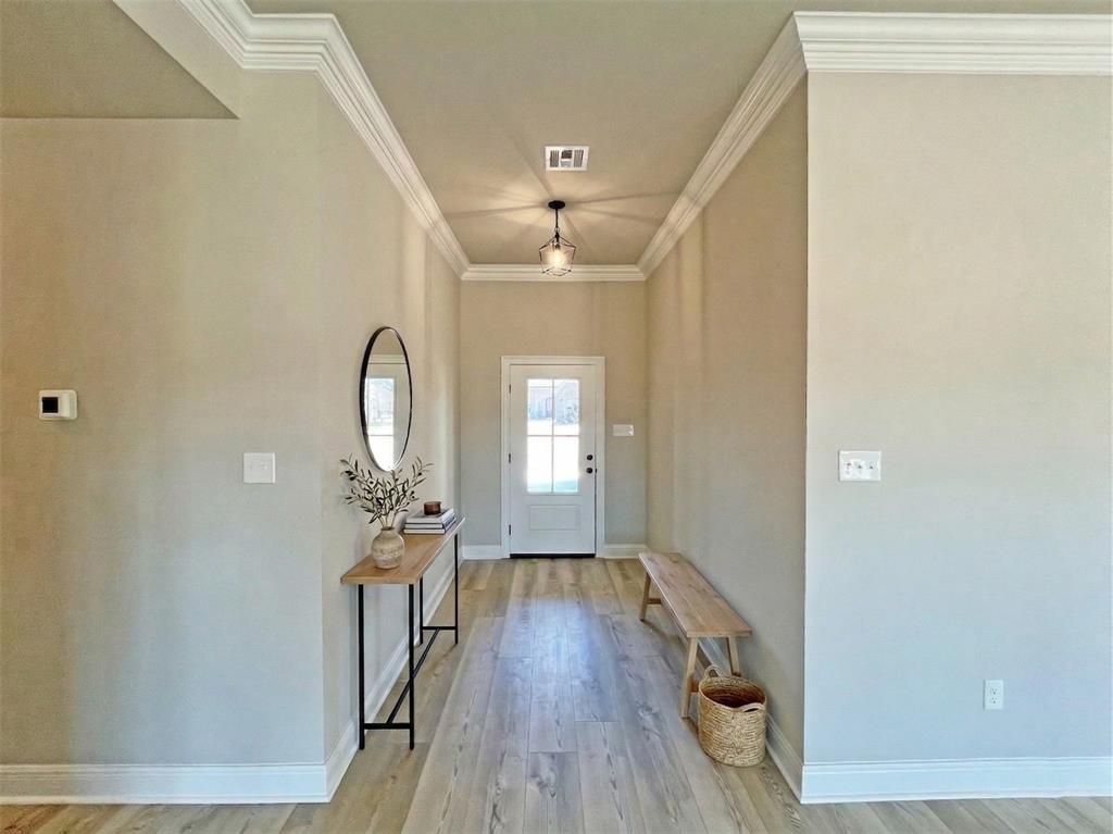 369 Hummingbird Lane Princeton, LA 71067 - Photo 3 of 22 a view of a livingroom with wooden floor