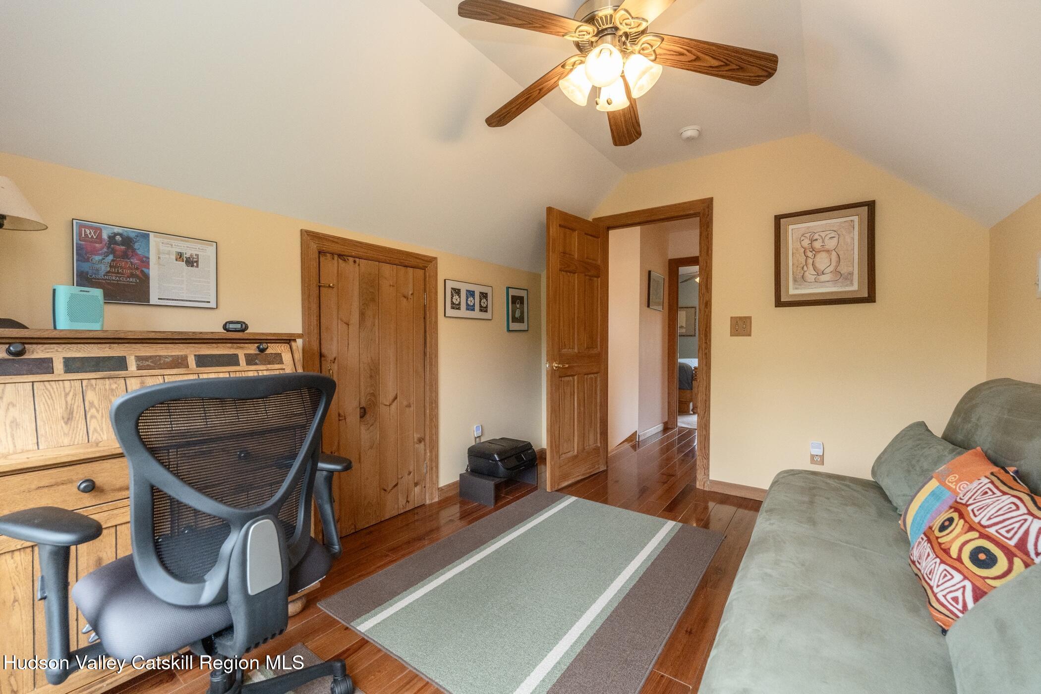 140 Stone Dock Road High Falls, NY 12440 - Photo 29 of 42 a room with furniture and a chandelier fan