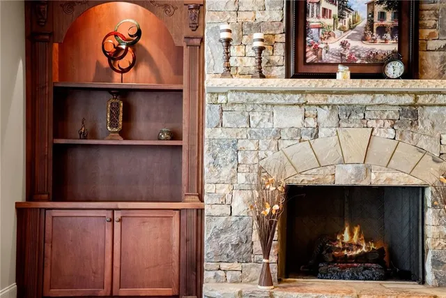 a front view of a house with a yard table and chairs