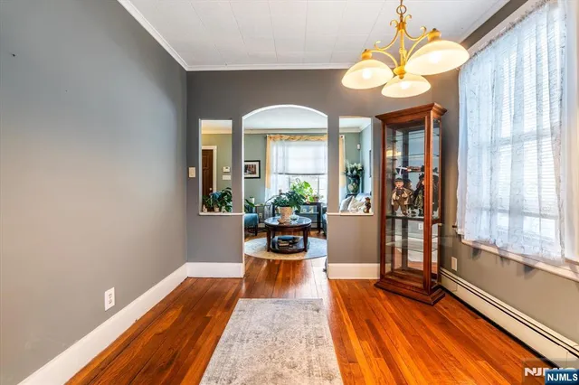 a view of a living room and a chandelier