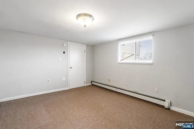 an empty room with a workbench