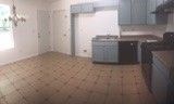 165 Pebble Creek Road Jackson, GA 30233 - Photo 2 of 5 a view of a refrigerator in kitchen and an empty room