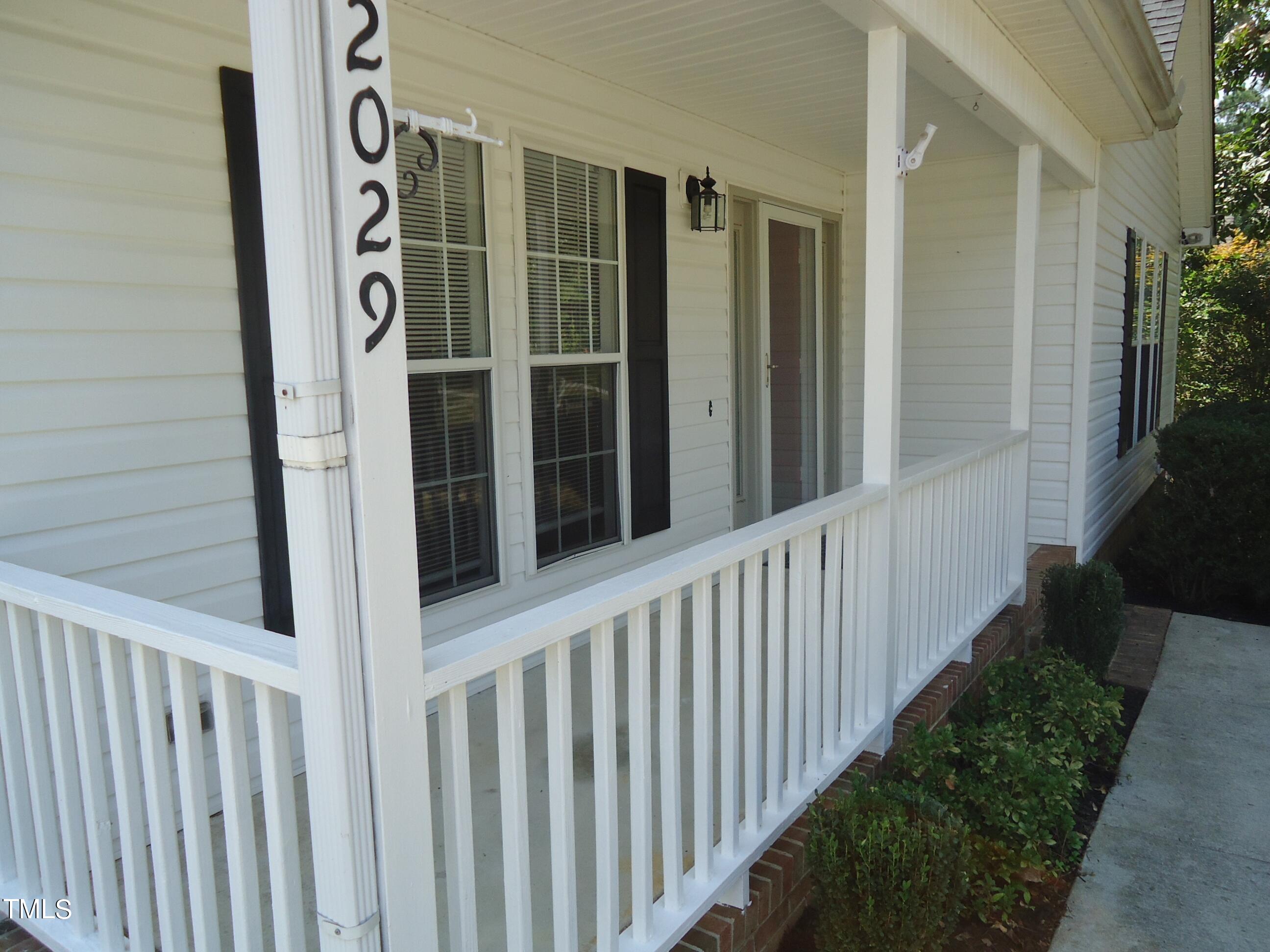 2029 Ruddy Road Raleigh, NC 27616 - Photo 3 of 33 a view of a house with a yard