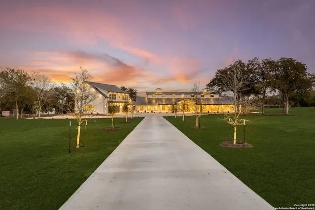 a view of a house with a big yard