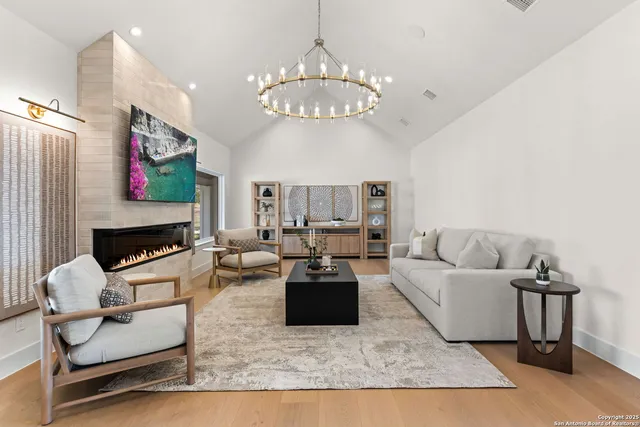 a kitchen with stainless steel appliances granite countertop a stove and a refrigerator