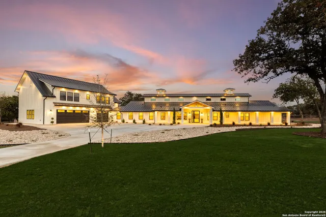 a view of a house with snow on the wall