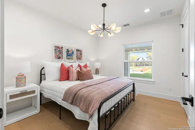 a kitchen with stainless steel appliances granite countertop a sink and stove