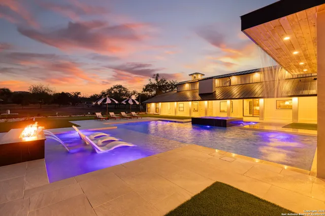 a view of an outdoor space patio swimming pool and mountains