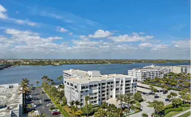 a view of a lake with a building in the background