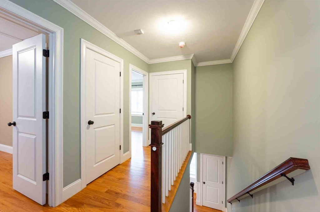 51 Branch Street, Unit 2 Quincy, MA 02169 - Photo 18 of 37 a view of a hallway view with staircase