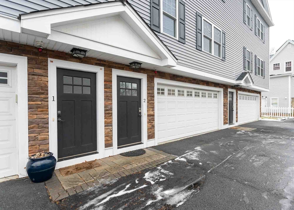 51 Branch Street, Unit 2 Quincy, MA 02169 - Photo 2 of 37 a view of a building entrance