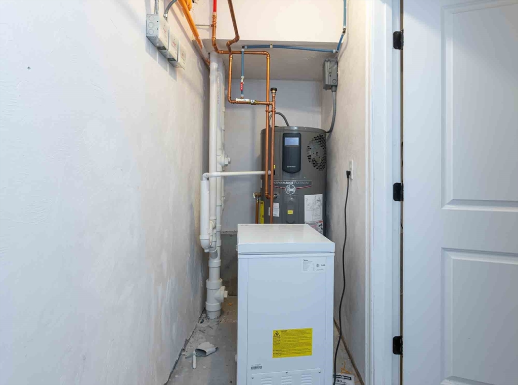 51 Branch Street, Unit 2 Quincy, MA 02169 - Photo 36 of 37 a utility room with dryer and washer