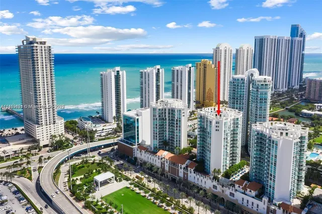 a view of a city with tall buildings